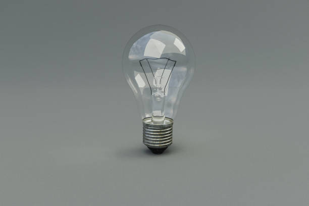 istock retro style lightbulbs with glowing filament standing on infinite colorful background; creativity design concept; 3D Illustration 1483905467