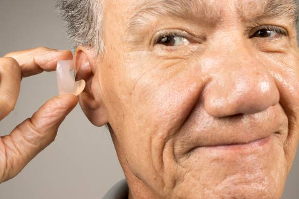 istock Closeup of a man wearing a plastic device in his ear 1483906228