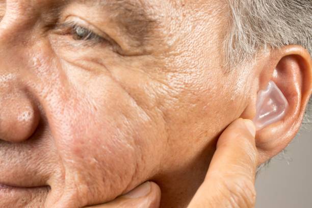 istock Closeup of a man wearing a plastic device in his ear 1483906237