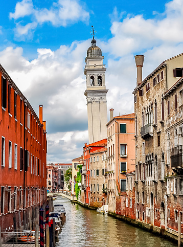 Venice canals and architecture with leaning San Giorgio tower, Italy