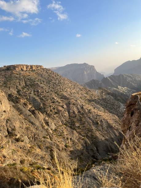 istock Aerial view of a majestic mountain range, featuring a desolate valley and rocky peaks 1483907705