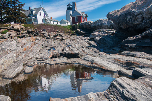 the historic Pemaquid point lighthouse and bell house at Pemaquid Point in Bristol maine.