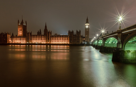 Long exposure of UK Houses of Parliament and Elizabeth Tower on Thames