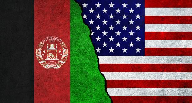istock USA and Afghanistan flag together on a textured wall 1483918107