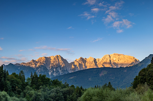 View of European Alps lightetd by early Sunshine near Salzburg, Austria Europe