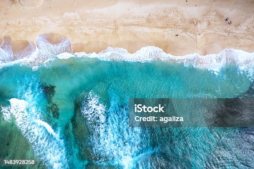 istock Aerial view of the north shore of Oahu, Hawaii, overlooking Ehukai Beach known for its large winter waves 1483928258