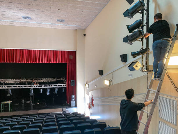 istock Sound technicians working on the installation of lights and spotlights 1483929998