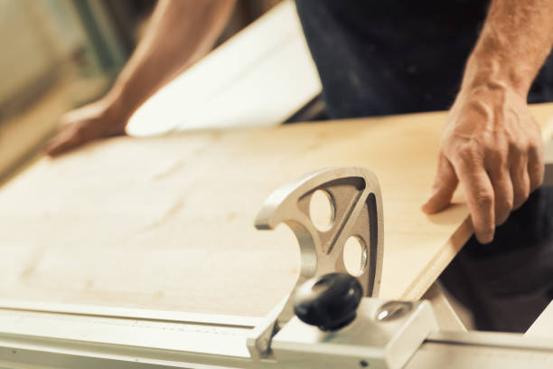 istock Strong male hands visible in wood workshop 1483930095