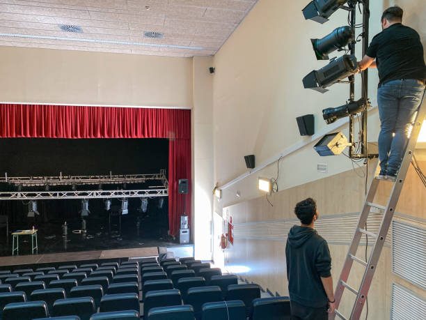 istock Sound technicians working on the installation of lights and spotlights 1483930253