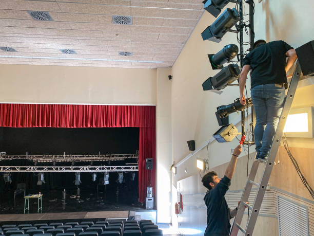 istock Sound technicians working on the installation of lights and spotlights 1483930293