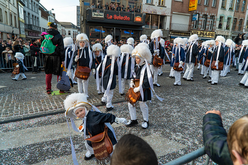 Tuebingen, Germany - February 09, 2020: Swabian Fasnet - Colorful carnival procession on the street of the old town of Tübingen - Swabian-Alemannic Fasnet is a pagan affair with old traditions