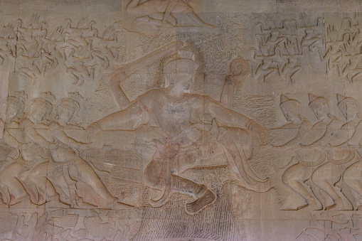 Churning of the Ocean of Milk Relief at at Angkor Wat. Angkor Wat was built in the 12th century and is part of the whole Angkor Complex outside of Siem Reap, Cambodia.