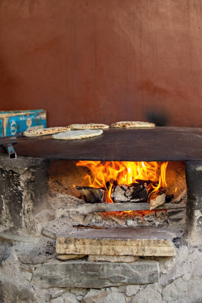 istock Bread on the fire in Pakistani village 1483942535