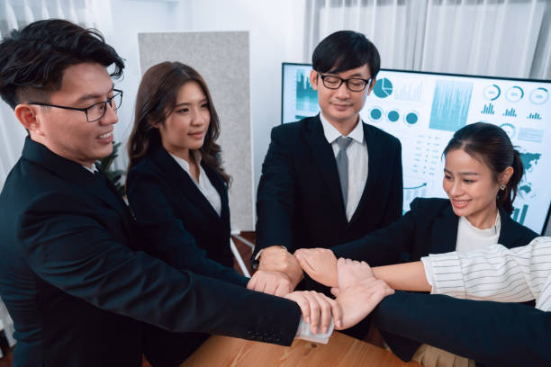 istock Businessmen and women join hand stack together, form circle for harmony concept. 1483946004