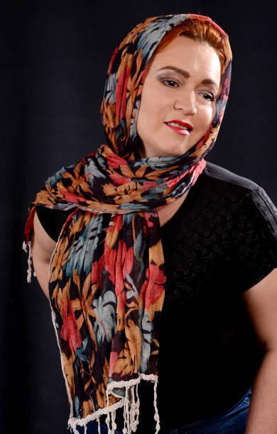 istock Young woman in a red scarf 1483946077