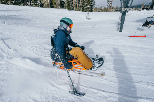istock Adaptive athlete sit-skiing on beautiful winter day 1483949174