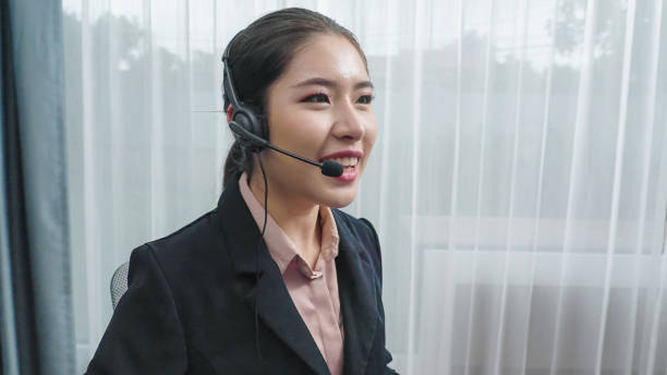istock Young enthusiastic female customer support operator put on headphone. 1483953594