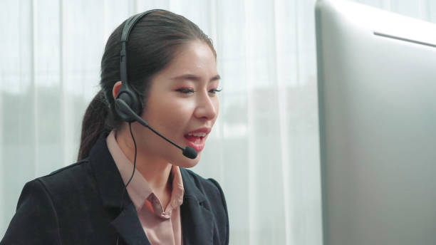 istock Enthusiastic female operator provide helpful customer service to customer. 1483953637