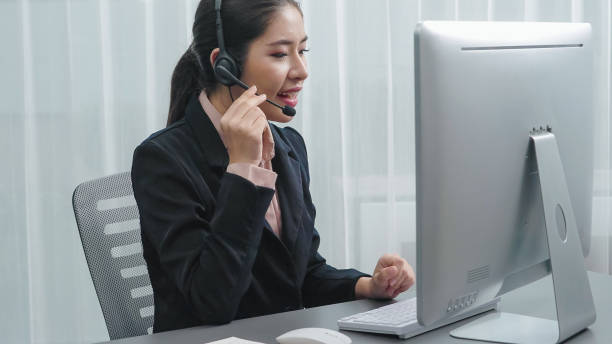 istock Enthusiastic female operator provide helpful customer service to customer. 1483953883