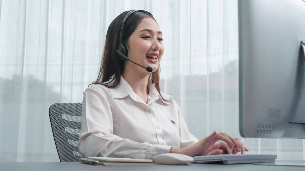 istock Enthusiastic female operator provide helpful customer service to customer. 1483954080