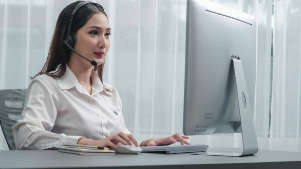 istock Enthusiastic female operator provide helpful customer service to customer. 1483954958