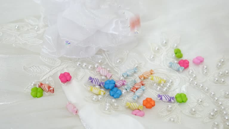 Falling beads. Set of multi-colored beads for needlework, embroidery.  Easy and creative craft for children and teenagers