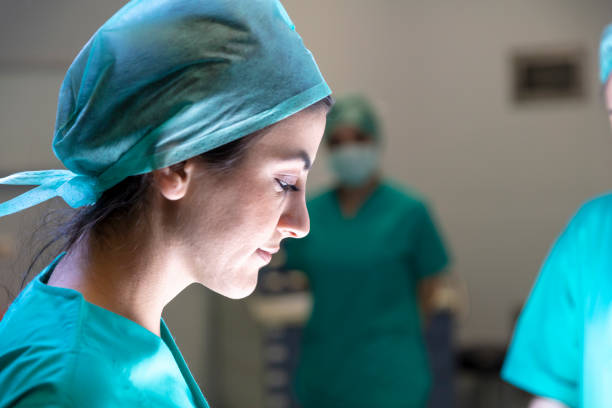 istock Team of nurses and surgeons in surgery 1483956355