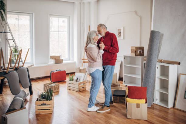 istock Happy couple dancing in new home 1483956775