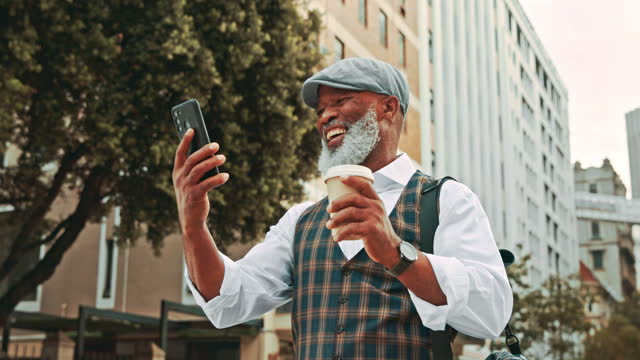 Black man, phone and celebrate in outdoor in city with a coffee for business travel with a smile. African fashion male happy with smartphone for winning competition, bonus or lottery on urban street