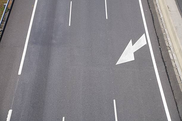 istock arrow sign noting centre lane 148398799