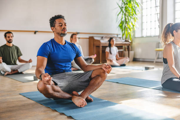 istock A Mixed Male Attending A Yoga Class 1483989713