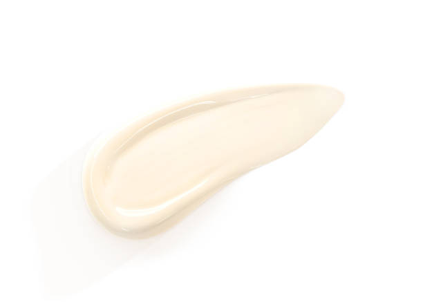 istock Cosmetic cream smear 3d render. Beige beauty product sample, makeup concealer, foundation, face mask, serum, milk or lotion, smudge drop texture, swatch isolated on white background 1483991561