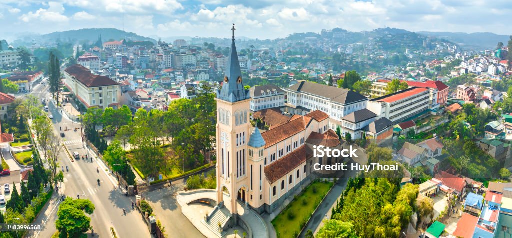 Aerial view outside Cathedral chicken in Da Lat, Vietnam on a morning Aerial view outside Cathedral chicken in Da Lat, Vietnam on a morning. Old French architecture attracts parishioners to pray for peace at the weekend Dalat Stock Photo