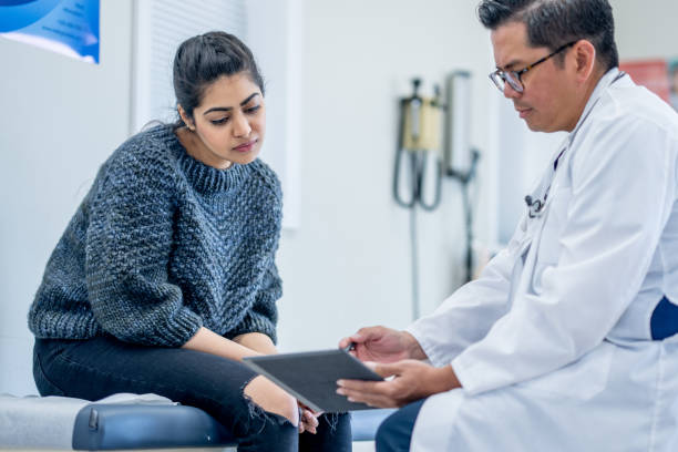 istock Young Woman at a Check-Up 1484000278