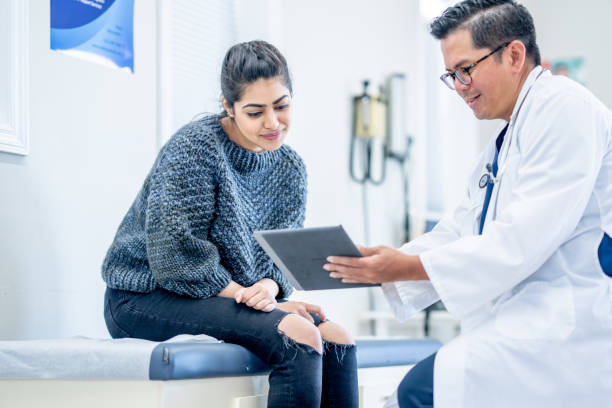 istock Young Woman at a Check-Up 1484000281