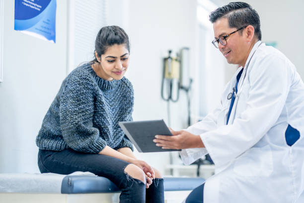 istock Young Woman at a Check-Up 1484000284