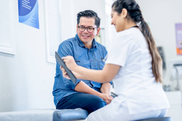 istock Middle Aged Gentleman at a Check-Up 1484000293