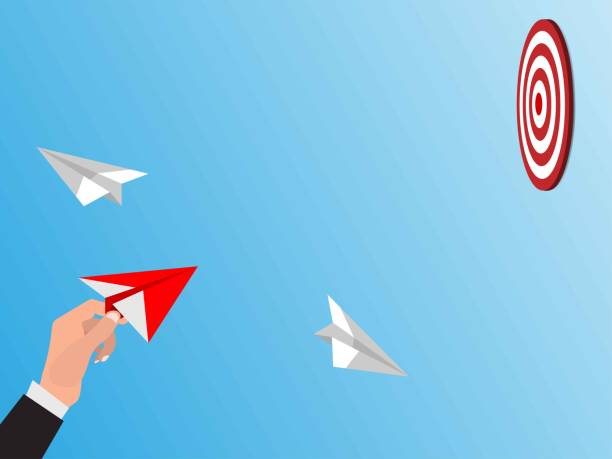 istock Group of paper plane in one direction and with one individual pointing in the different way. 1484016424
