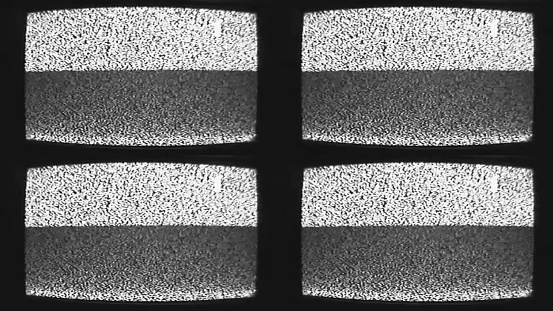 Screen glitch analog TV static noise. Retro technology. Black white grain channel distortion on old television set display pattern dark illustration abstract background.