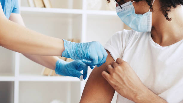 istock Vaccine shot virus immunization doctor jab patient 1484018419