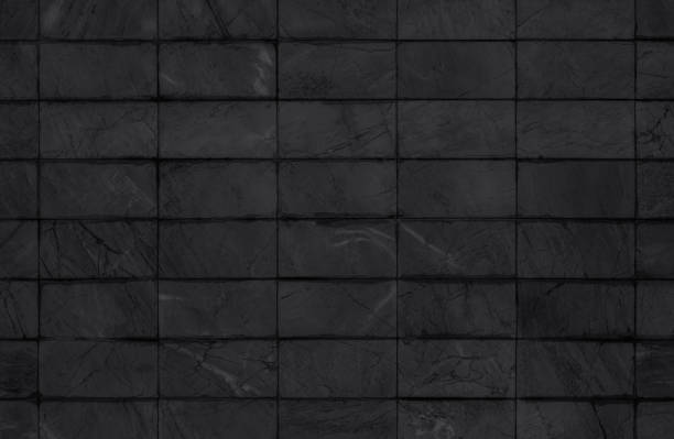 istock Black tiles ceramic wall and floor, dark marble abstract background. Design geometric mosaic texture decoration of the bedroom. Simple seamless pattern for backdrop hospital wall, canteen and grid. 1484020671