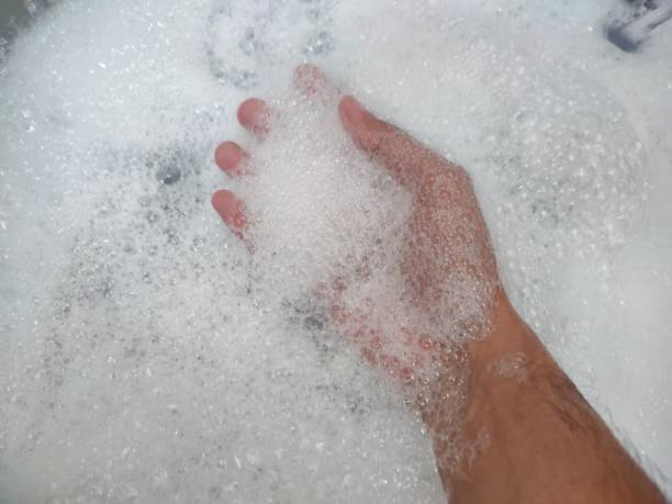 istock hand full of foam 1484021628