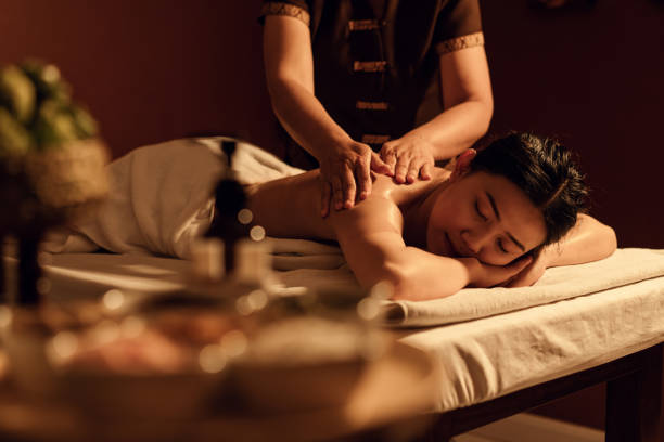 istock Aromatherapy Relaxing back massage with masseur in cosmetology spa centre. 1484026070