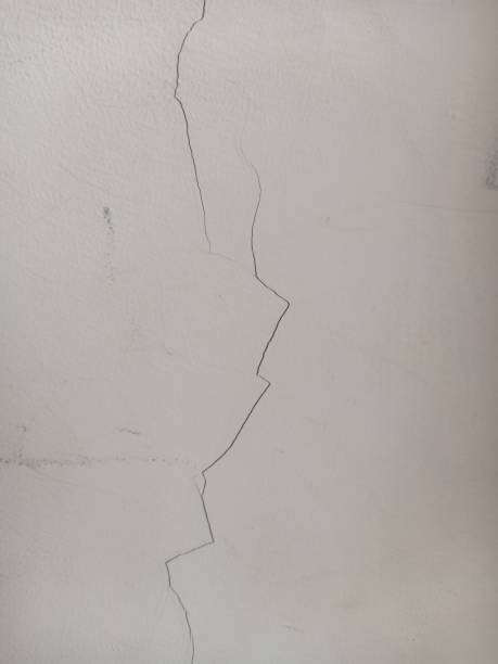 istock Full frame shot of cracked wall 1484027459