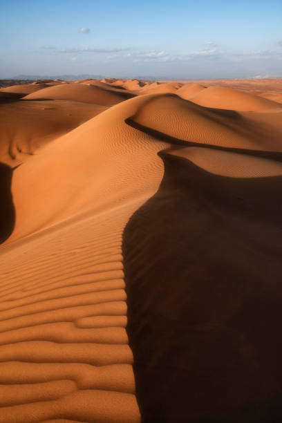 Sunset over Ripples on Sand Dunes, Wahiba Sands Desert, Oman