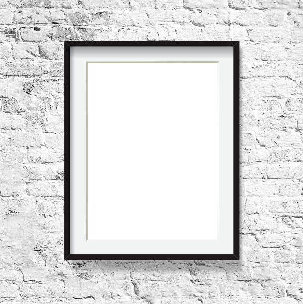istock blank picture frame on white brick wall, mock up for adding your design 1484030670