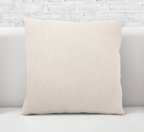 istock blank Cotton linen throw pillow on a sofa ,white brick wall, mock up for adding your design 1484030674