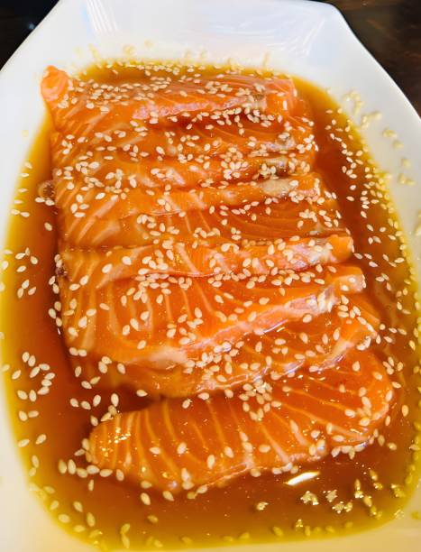 istock salmon with sauce and sesame seeds 1484033469