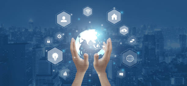 istock Close up of human hands using digital interface with icons on city background 1484035408