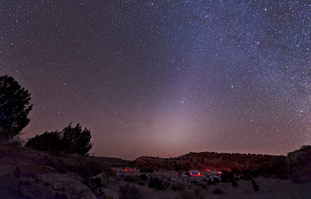 Zodiacal Light over star party stock photo